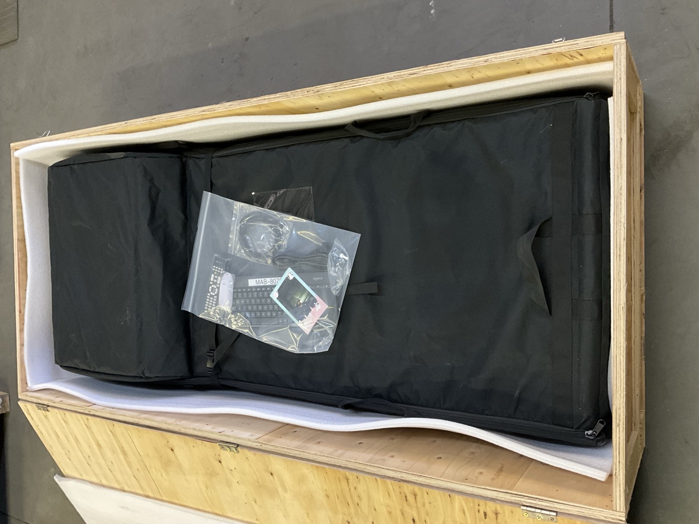 Inside the crate — booth in carry bag with accessories pouch